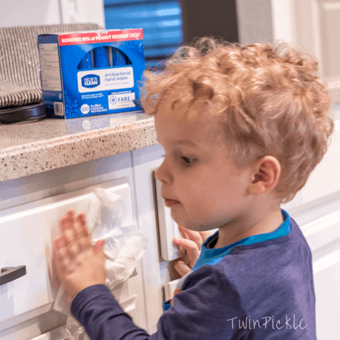 Wiping cabinets with wet wipes