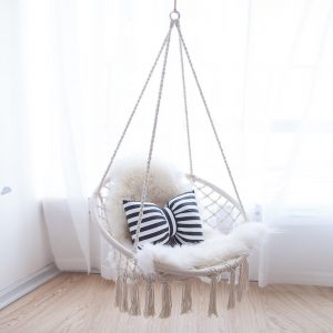 hanging white wicker chair